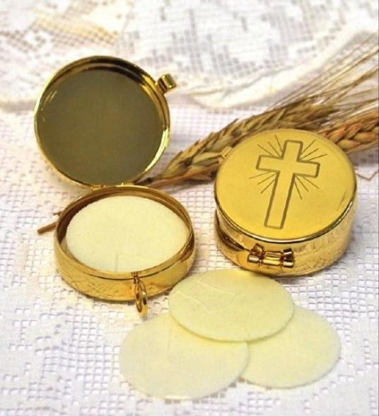 Custode contenant les hosties pour la communion à domicile